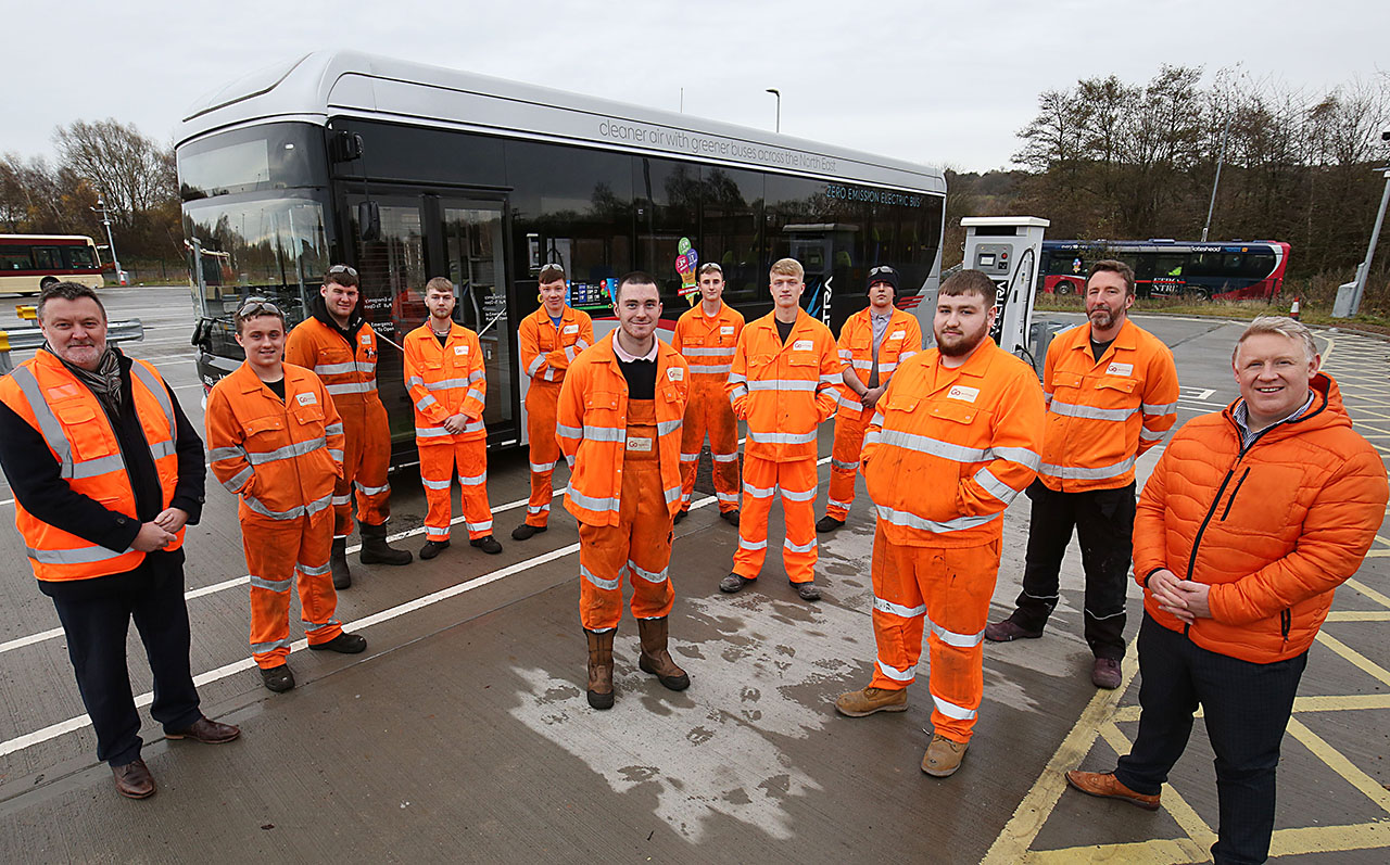 L-R Kevin Marston Gateshead College with some of the apprentices and Colin Barnes at Go North East (far right)
